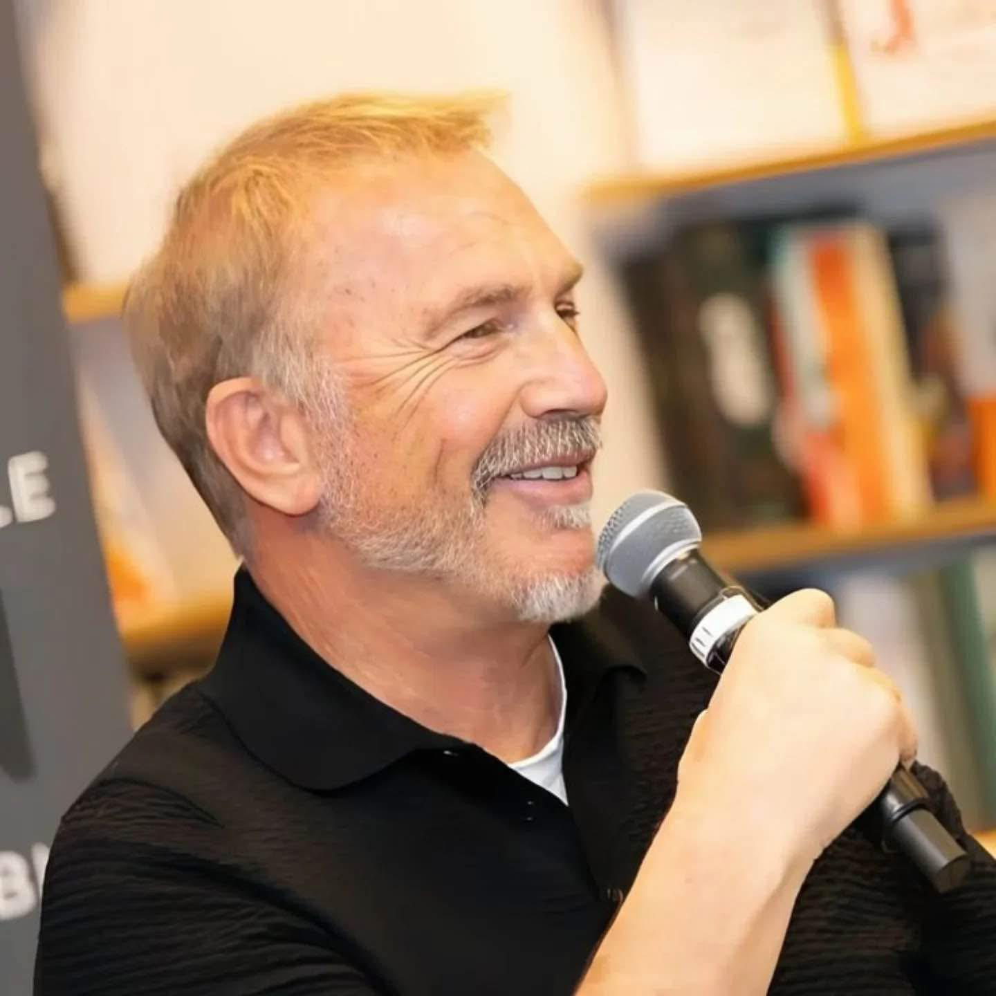Kevin Costner performing