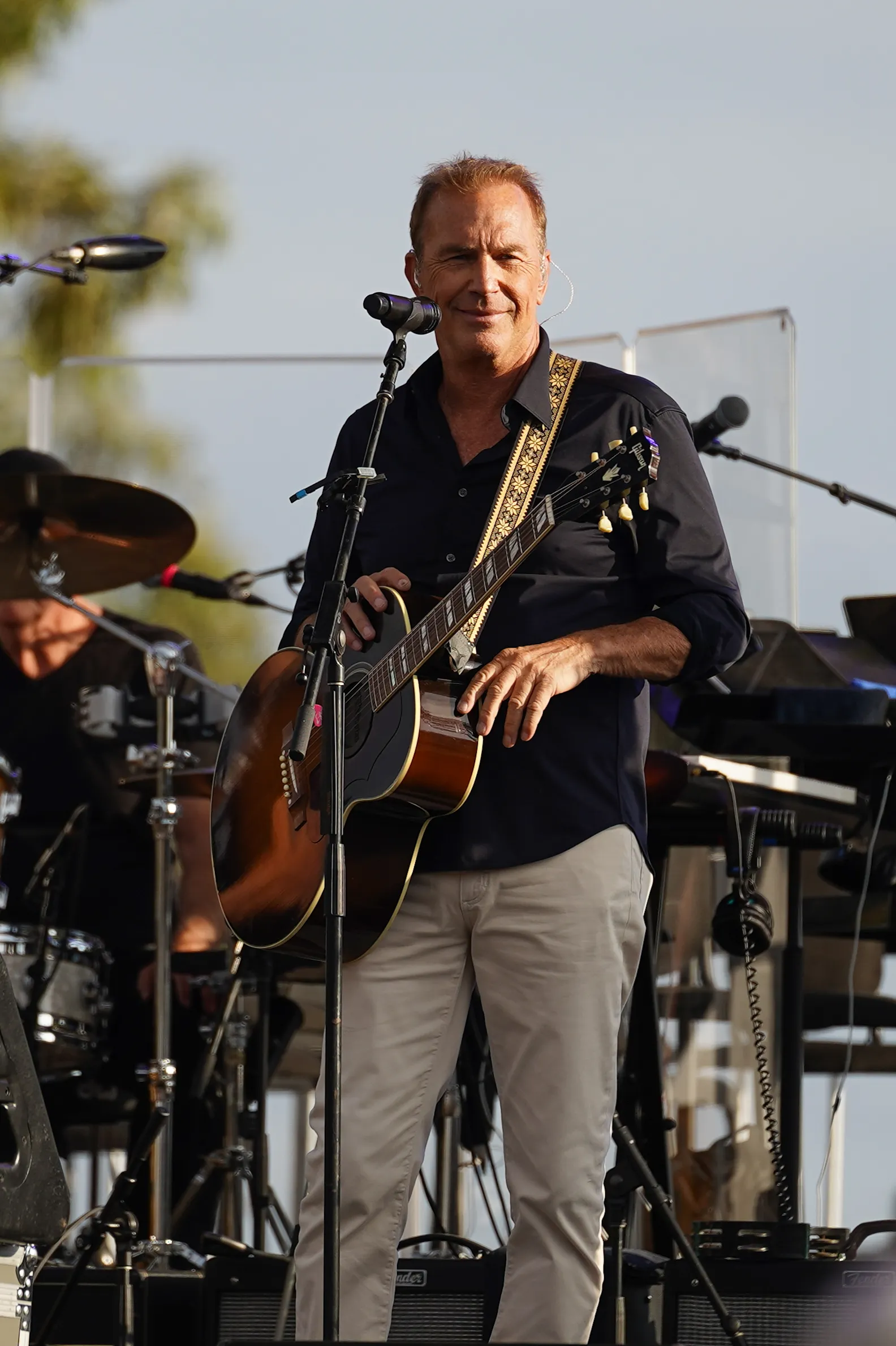 Kevin Costner performing live
